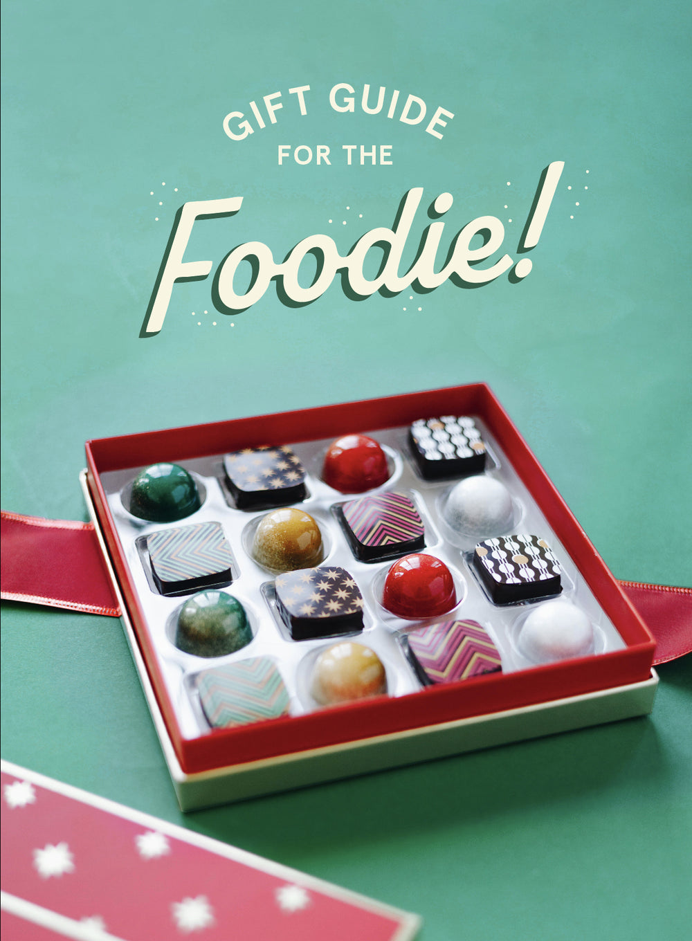 text that reads gift guide for the foodie! and picture of chocolates in a box